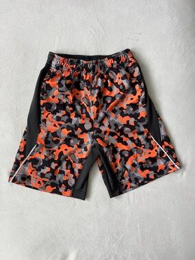 Nike Kid’s Orange and Black Camo Athletic Shorts